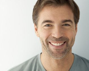 Fun couple enjoys a day at the beach